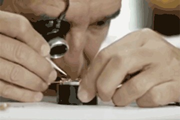 欧米茄表进水维修